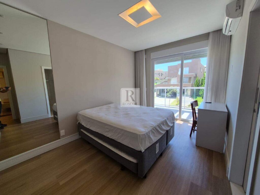 Casa no Alphaville com 4 suítes e vista da lagoa e da Serra da Moeda